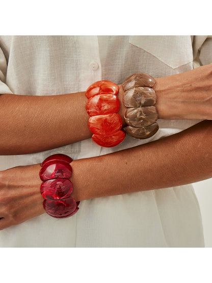 Lovra vintage textured link bracelet worn on wrist with casual outfit