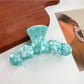 Beau hair claw clip open to show inner spring and clasp details