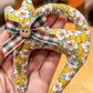 Close-up of Keypus cartoon cat charm keychain's facial details and vibrant colors