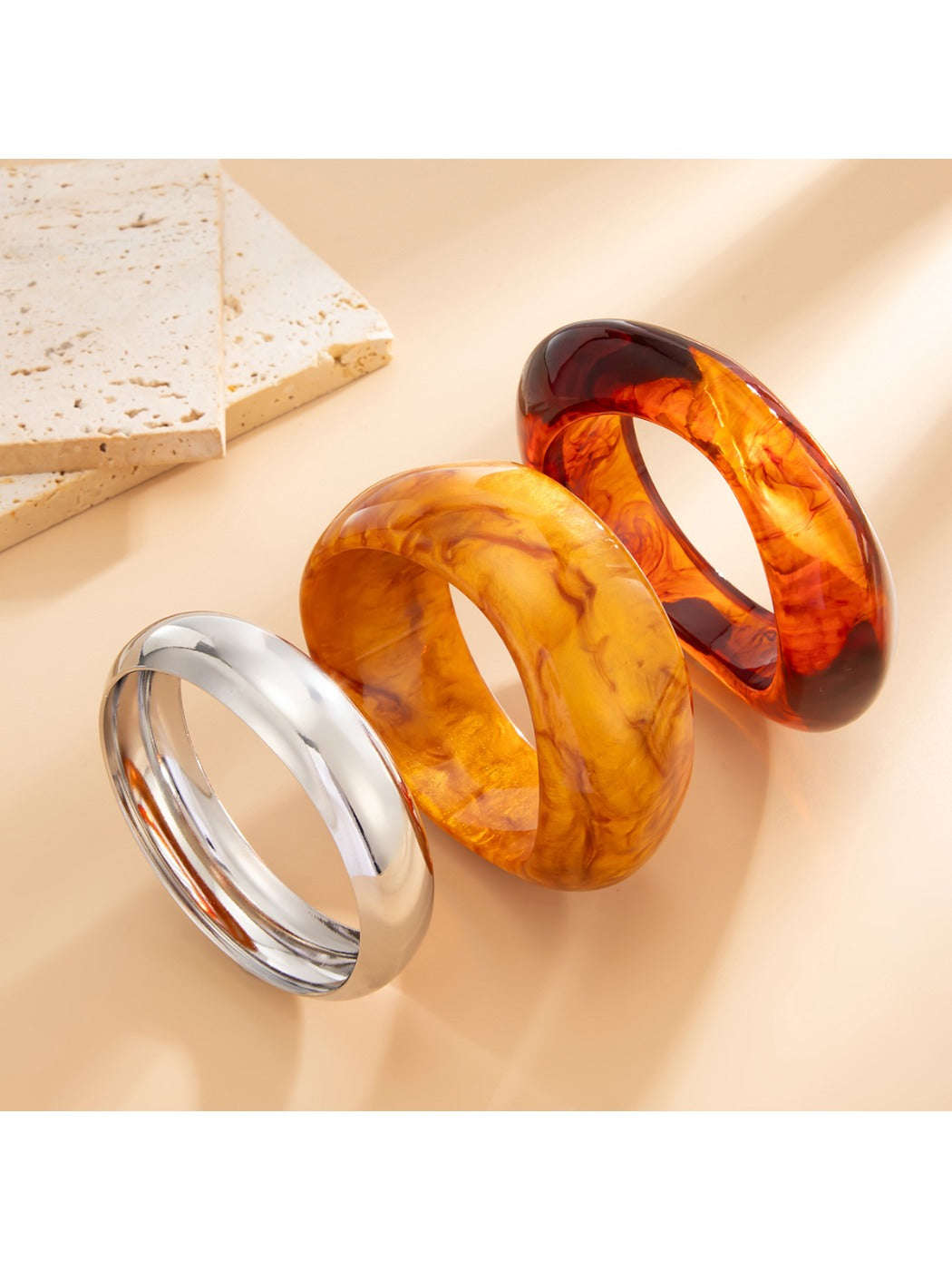 Close-up of Lovra vintage polished irregular bangle bracelet showing texture