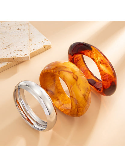 Close-up of Lovra vintage polished irregular bangle bracelet showing texture