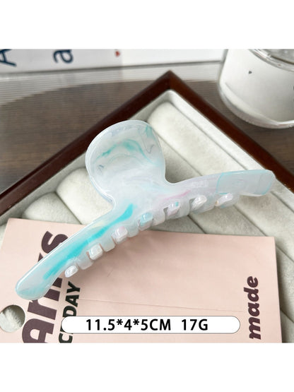 Top view of Beau minimalist large claw clip highlighting curved design