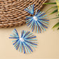 Earedge raffia earrings styled with casual summer clothing
