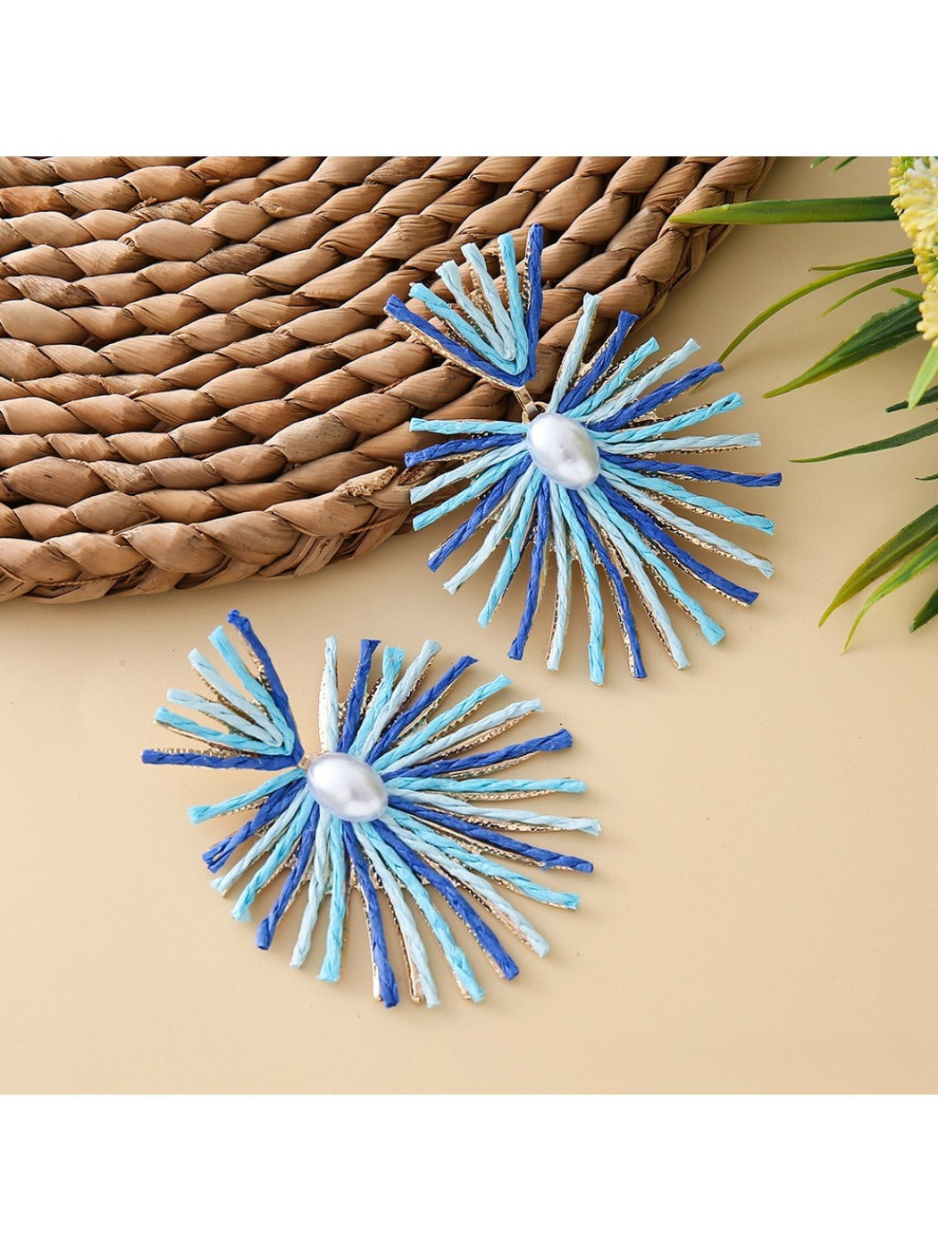 Earedge raffia earrings styled with casual summer clothing
