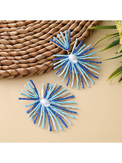 Earedge raffia earrings styled with casual summer clothing