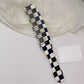 Camerow long handle hair comb angled to show thickness and durability