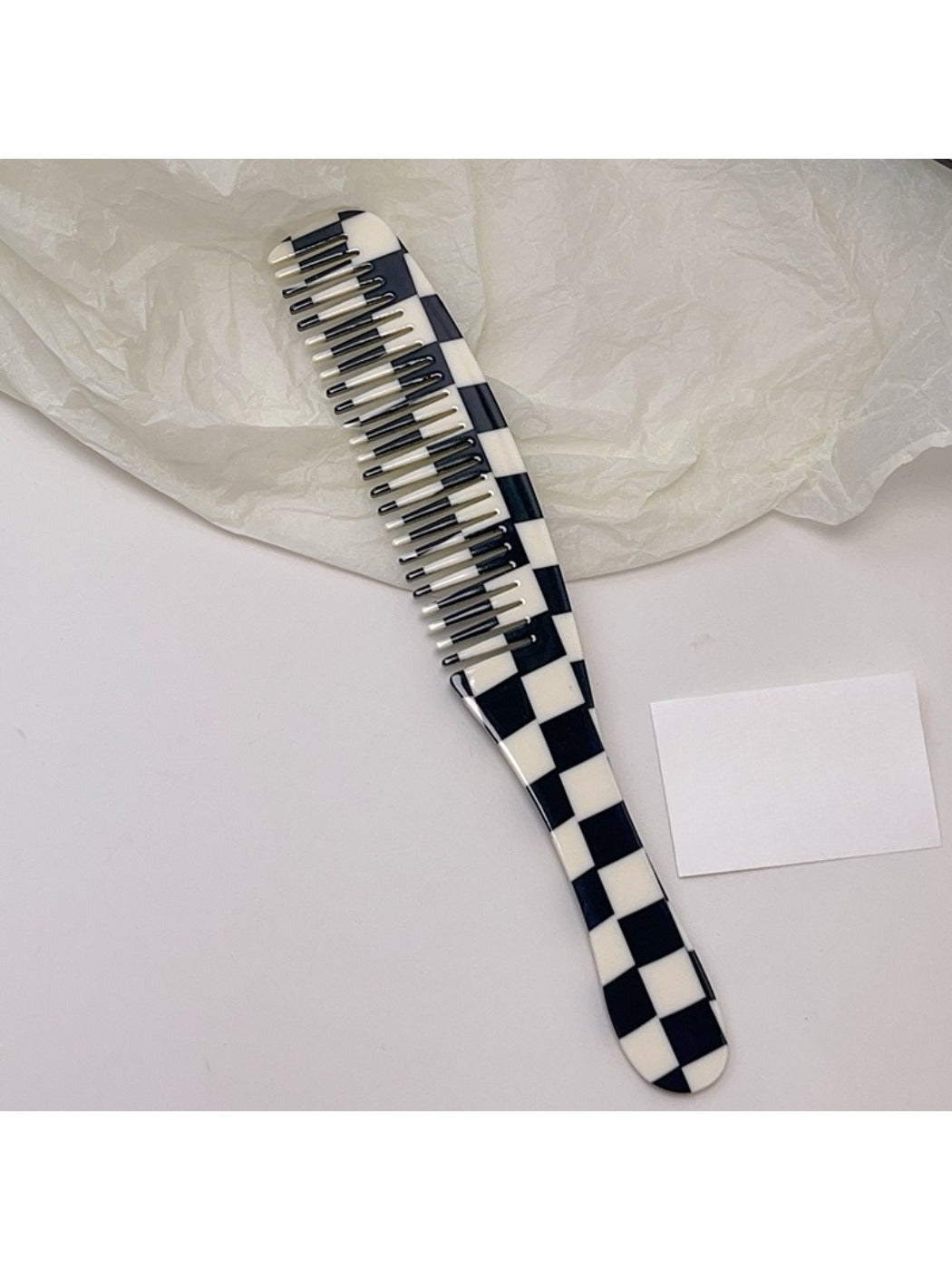 Camerow long handle hair comb angled to show thickness and durability