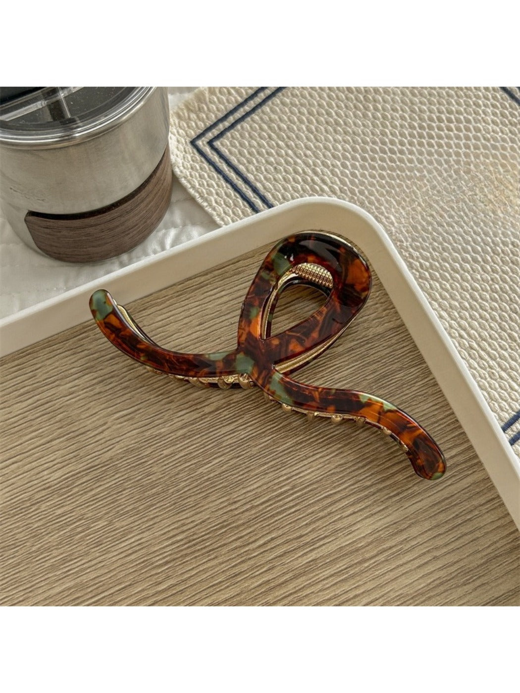 Beau Artistic Bright Hair Clip displayed on white surface with natural lighting emphasizing bright hues