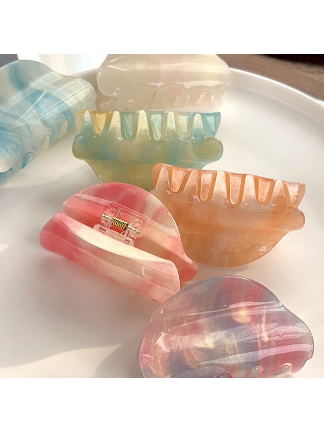 Side view of Beau colorful hair claw clip highlighting curved design