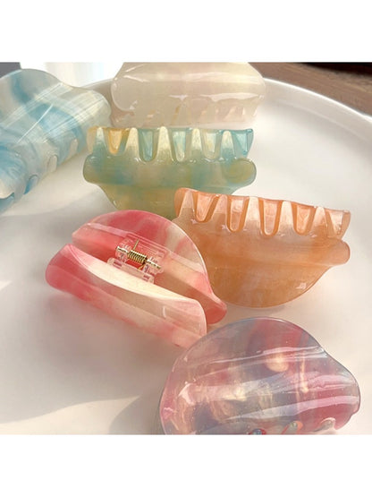 Side view of Beau colorful hair claw clip highlighting curved design