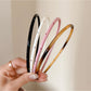Gifty vintage chic thin headband in soft beige fabric with subtle texture