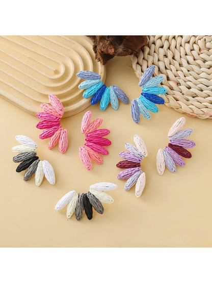 Earedge color block raffia fan-shaped earrings in natural and blue tones on white background