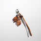 Top view of green leaf shaped Keypus keychain showing detailed veins