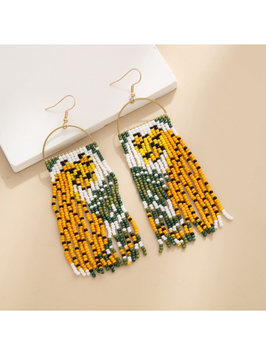 Earedge - Long Animal Shaped Tassel Earrings