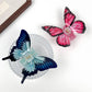 Side view of Beau butterfly hair claw clip highlighting spring mechanism