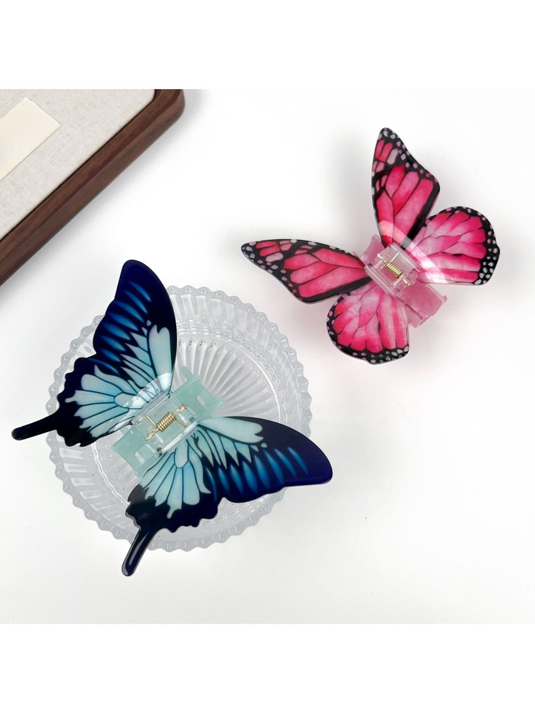Side view of Beau butterfly hair claw clip highlighting spring mechanism