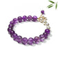 Side view of Lovra vintage butterfly beaded bracelet highlighting bead details and butterfly charm