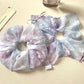 Gifty ombre scrunchie displayed on a white background showing fabric texture