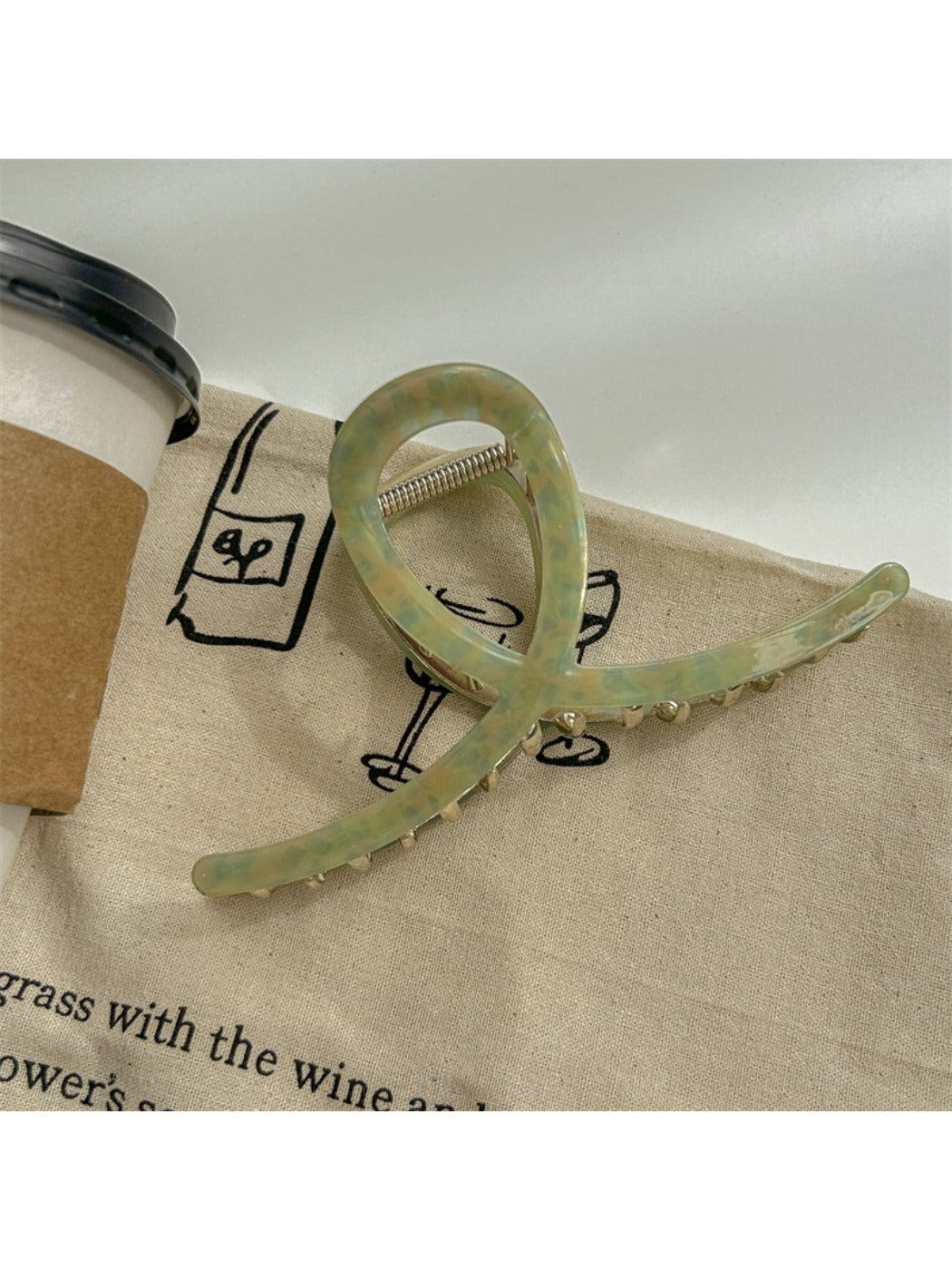 Beau large acetate claw clip shown from top view emphasizing its oval shape