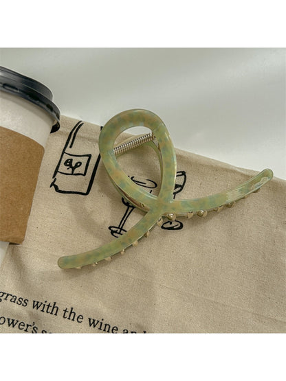 Beau large acetate claw clip shown from top view emphasizing its oval shape