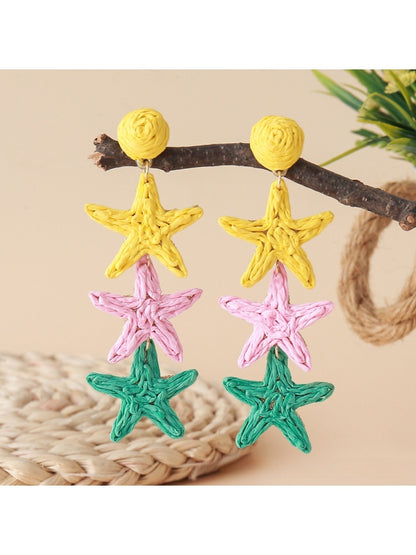 Side view of Earedge star pendant earrings showing clasp design