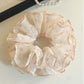 Gifty chiffon scrunchie displayed on a white background