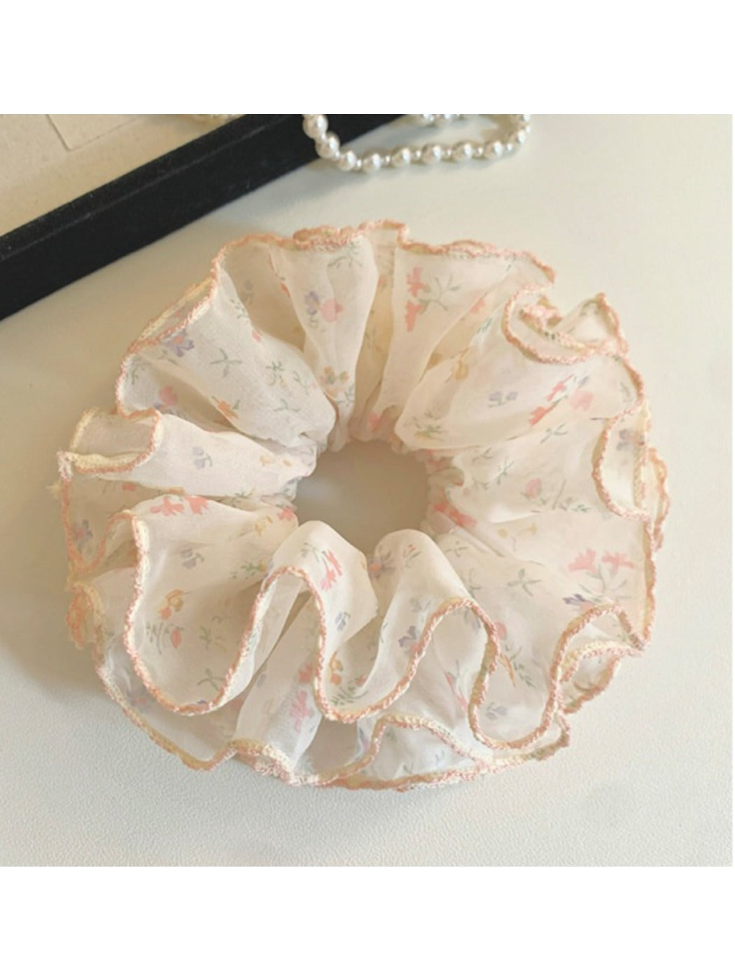 Gifty chiffon scrunchie displayed on a white background