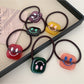 Gifty - Block Smiley Face Hair Tie