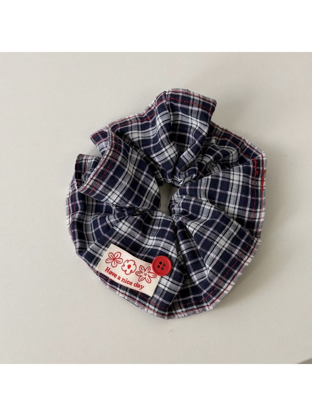 Blue headband displayed flat to show full length and width