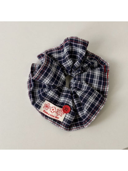 Blue headband displayed flat to show full length and width