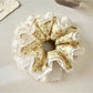 Gifty vintage floral ruched scrunchie displayed on a white background