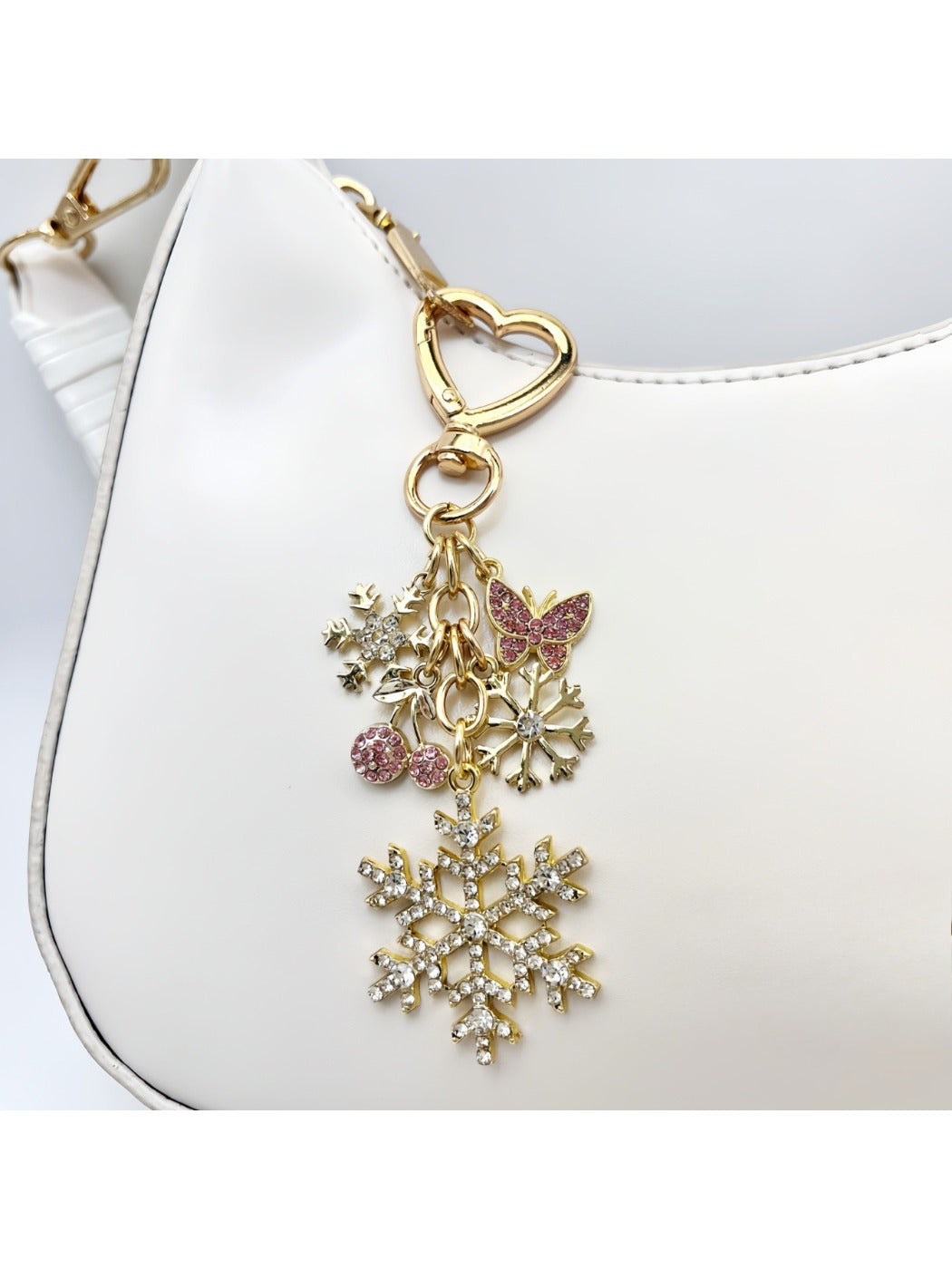 Detailed view of intricate snowflake design on silver keychain pendant