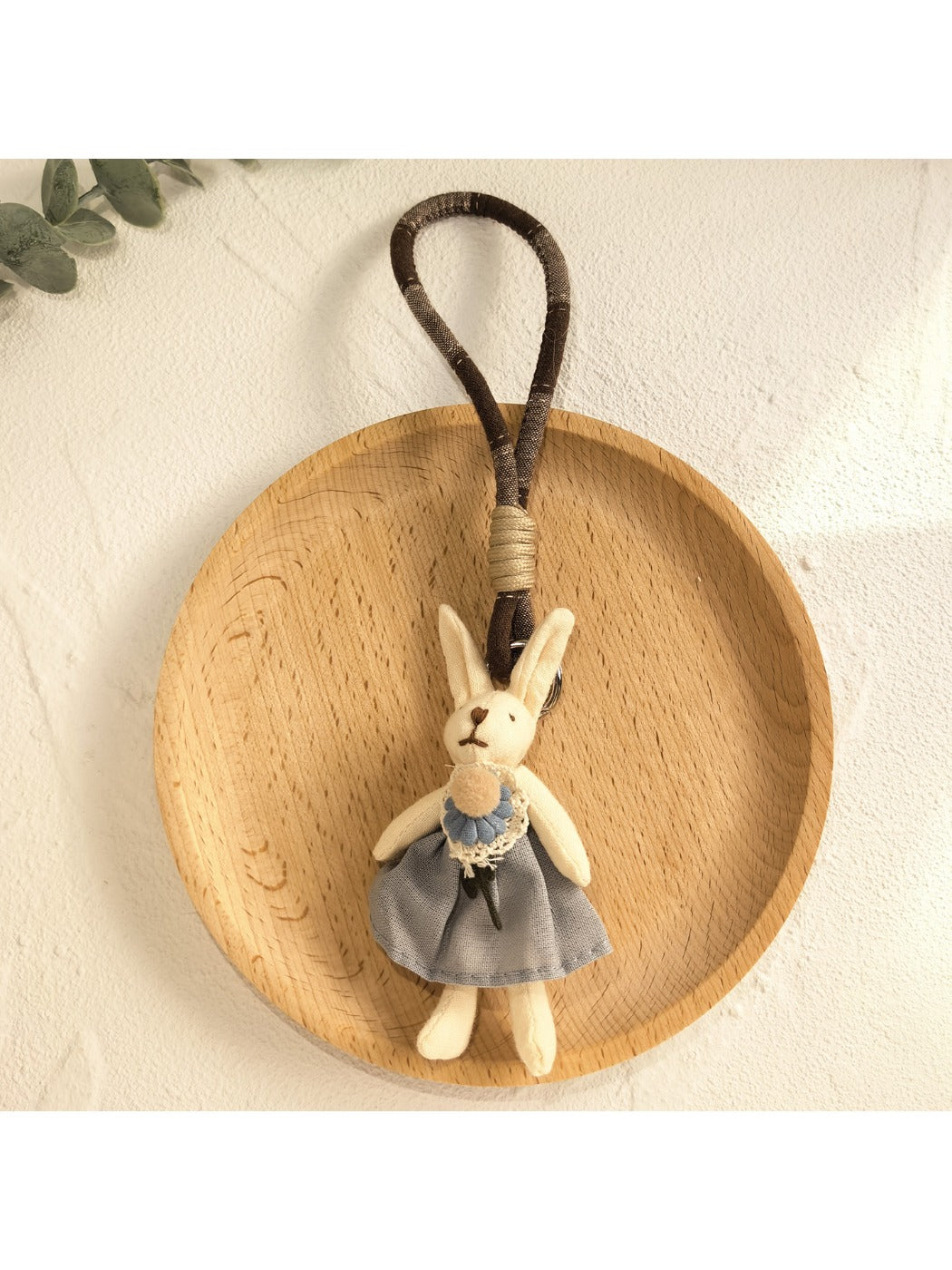Bunny pendant keychain displayed on a white background with soft shadows