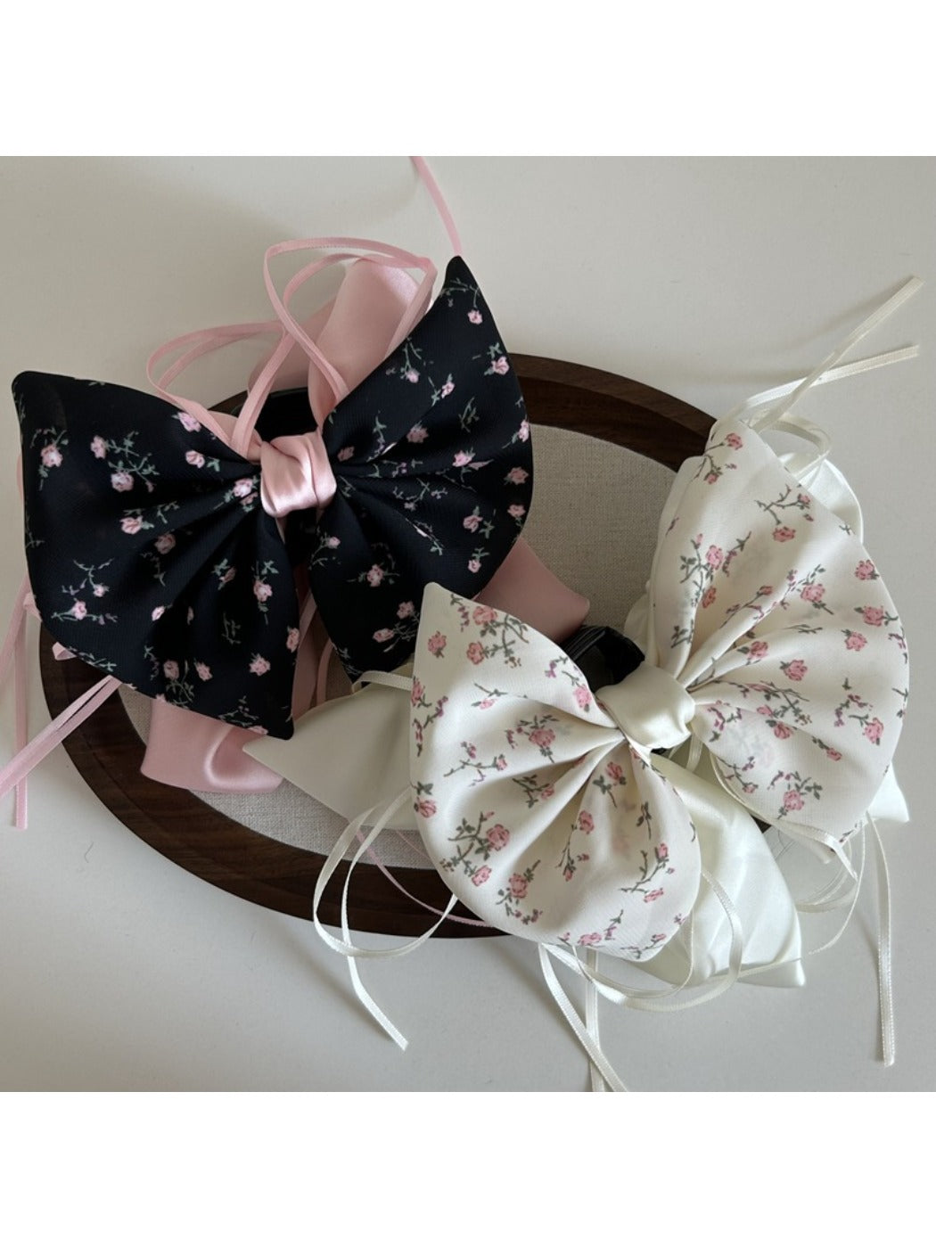 Beau Sweet Tiny Floral Bow Claw Clip on white background showing front view