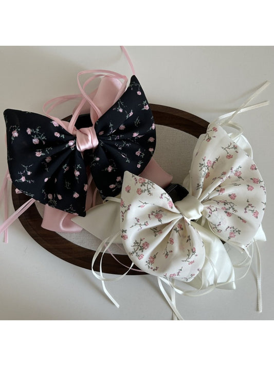 Beau Sweet Tiny Floral Bow Claw Clip on white background showing front view