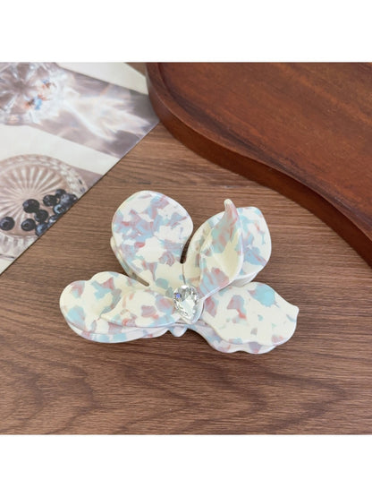 Beau acetate moth orchid claw clip displayed open showing inner teeth