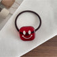 Gifty - Stylish Smiley Face Hair Tie