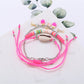 Lovra Earedge Ocean Style multi-row bracelet coiled to display its ocean-inspired design and colors