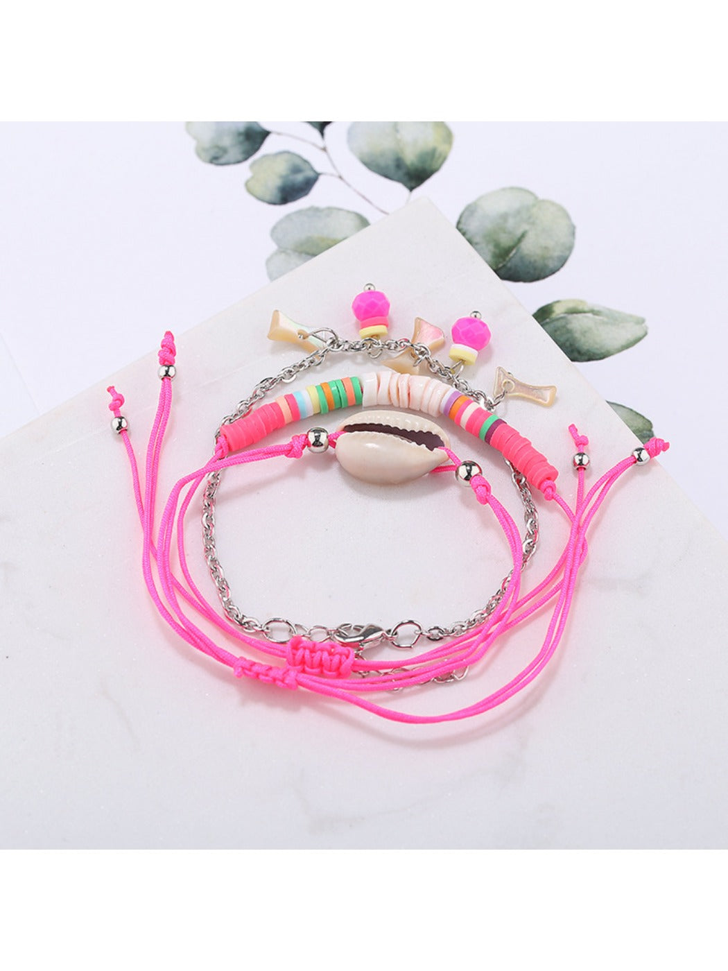 Lovra Earedge Ocean Style multi-row bracelet coiled to display its ocean-inspired design and colors