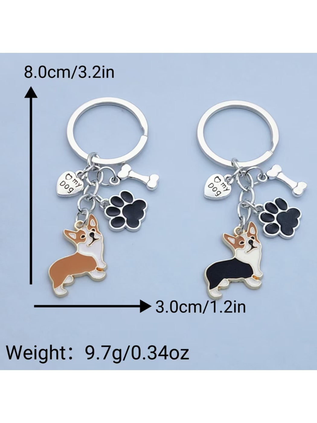 Both puppy and puppy paw keychains displayed on a wooden surface