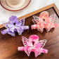 Side view of Beau butterfly decorated hair claw clip showing clasp mechanism
