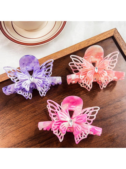 Side view of Beau butterfly decorated hair claw clip showing clasp mechanism