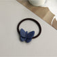 Gifty - Solid Colored Butterfly Hair Tie