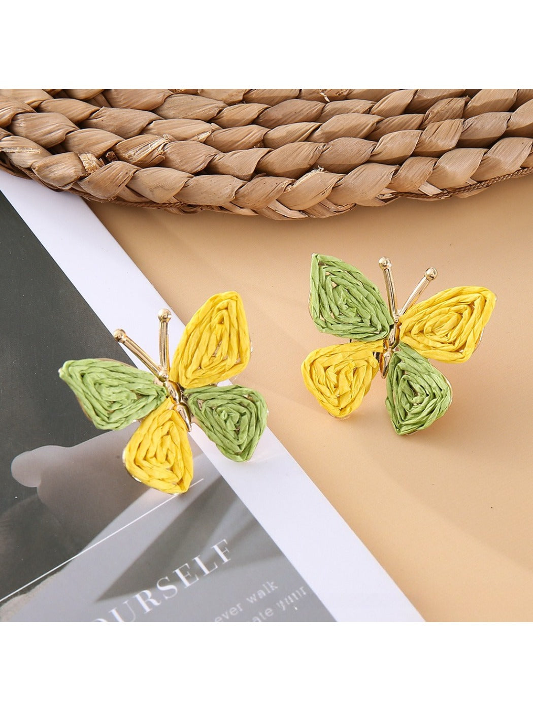 Earedge butterfly shaped drop earrings in a gift box with soft padding