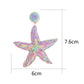 Side view of silver starfish drop earring showing detailed texture
