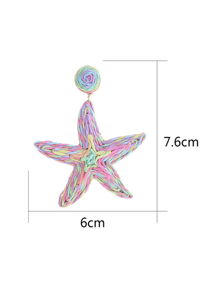 Side view of silver starfish drop earring showing detailed texture