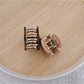 Beau medium half ponytail claw clip securing hair in a half ponytail style