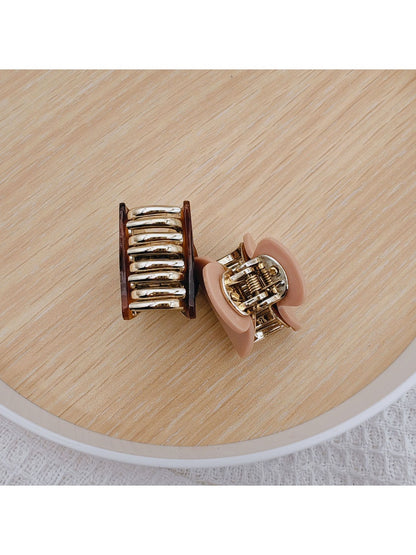 Beau medium half ponytail claw clip securing hair in a half ponytail style