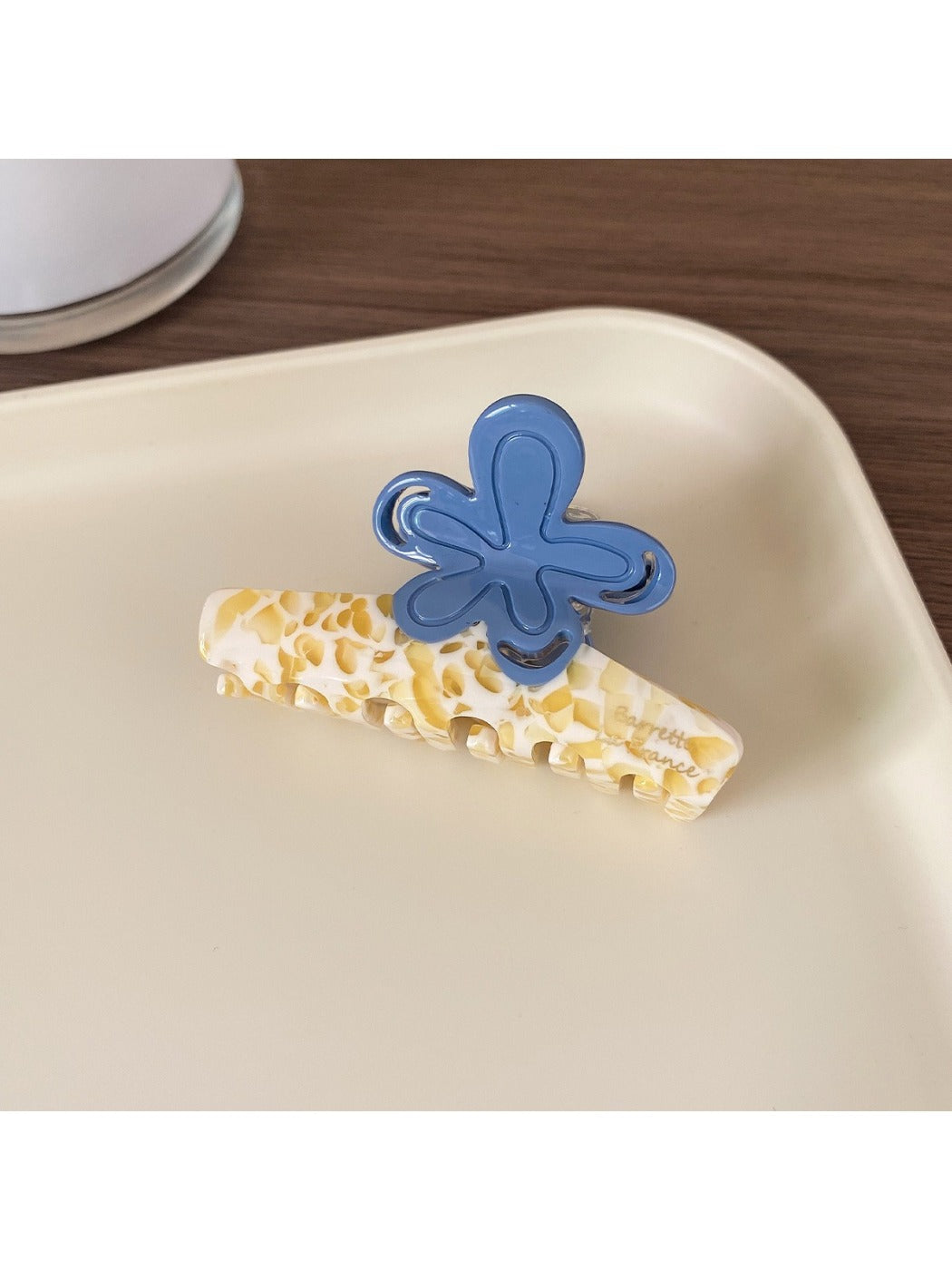Beau Half Moon Flower Hair Claw Clip from top angle showing flower pattern and clip teeth