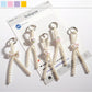 Keypus cute bow beaded keychain with pink and white beads on a silver keyring